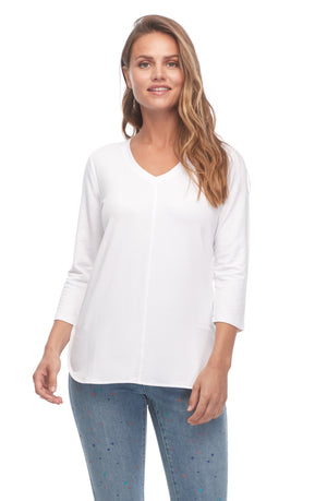 Woman in Pazazz white v-neck top, woman's wear