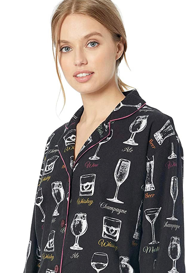 Woman in black long pyjama set with varying cups printed in white Pazazz Shelbrune Ontario