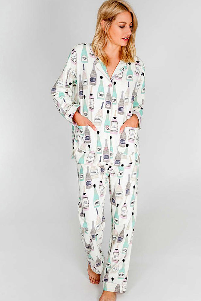 woman in white long pj set sip sip hooray shop Pazazz women's clothes online 